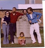 At Poe's Grave with (l-r) Pam Plymell, Rod McKuen, Paul Grillo, Charles Plymell, Liz Plymell seated. McKuen with Poe